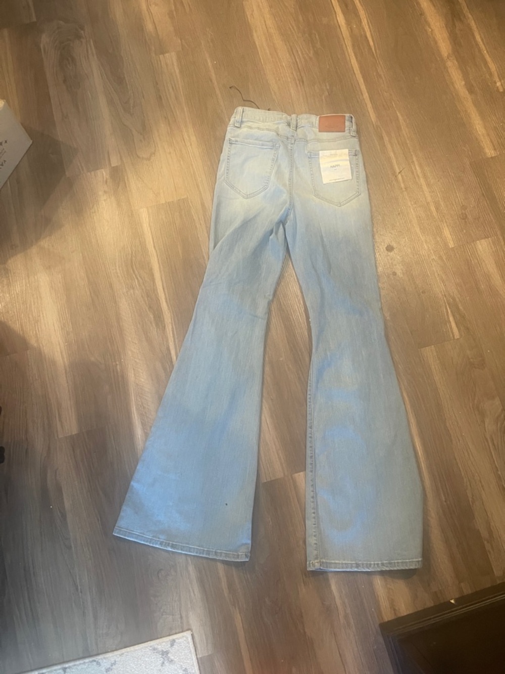 High-Rise Light Blue Distressed Flare Jeans - Women's - Picture 2 of 3